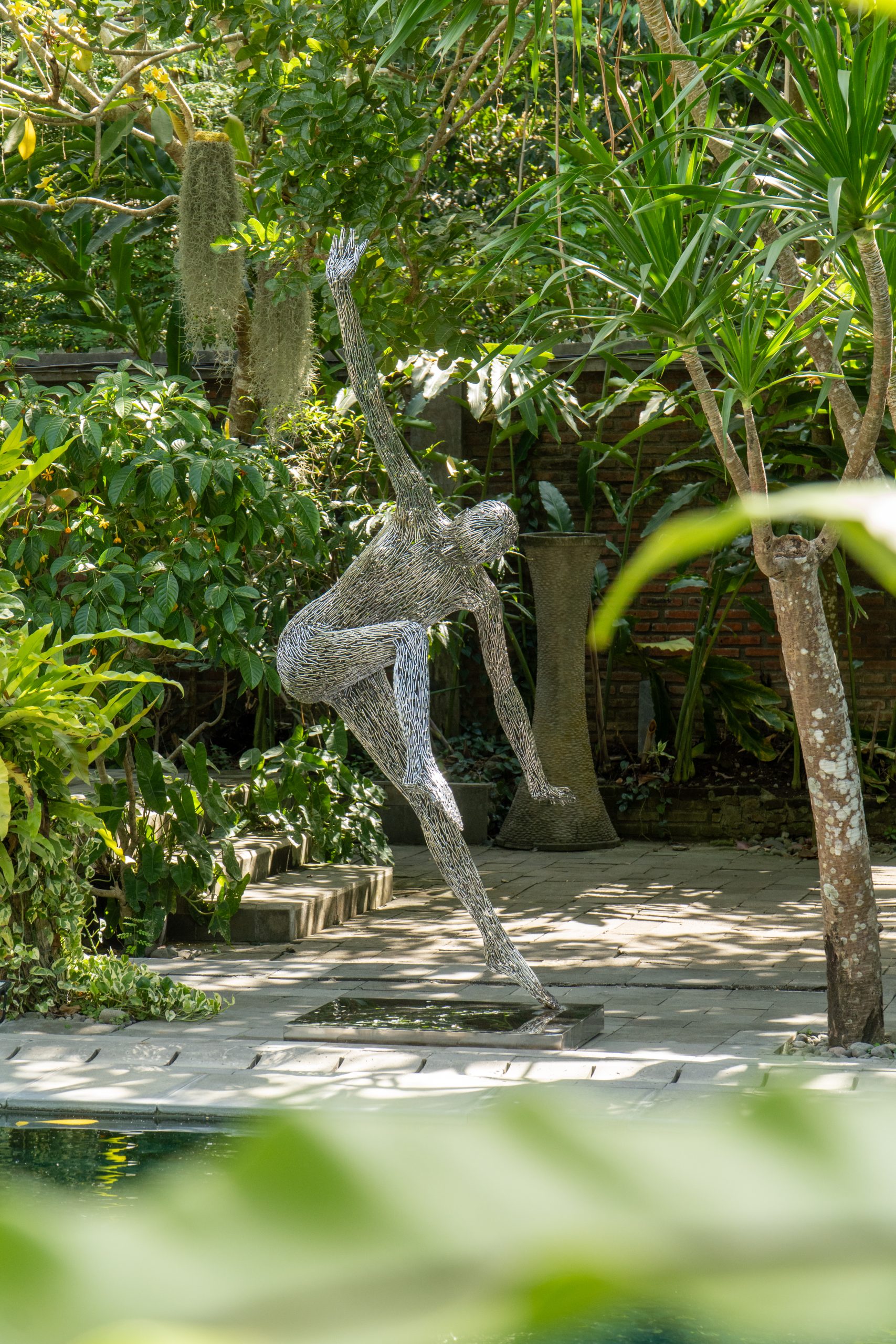 Stainless Kicking Abstract On Stand